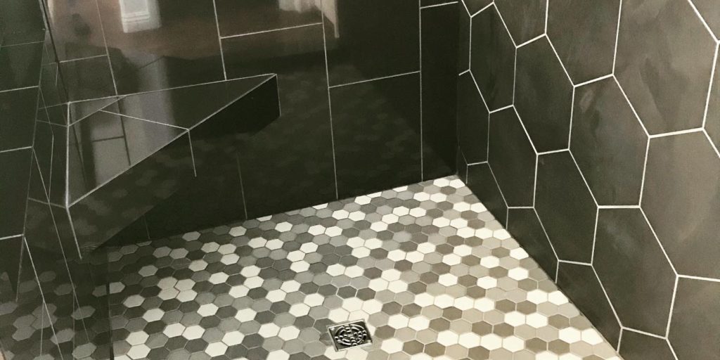 416ef342-9276-4beb-b852-761e26591018-1 10x13 black hexagon w/ 12x24 polished black porcelain. 2x2 hexagon multi color floor tile.